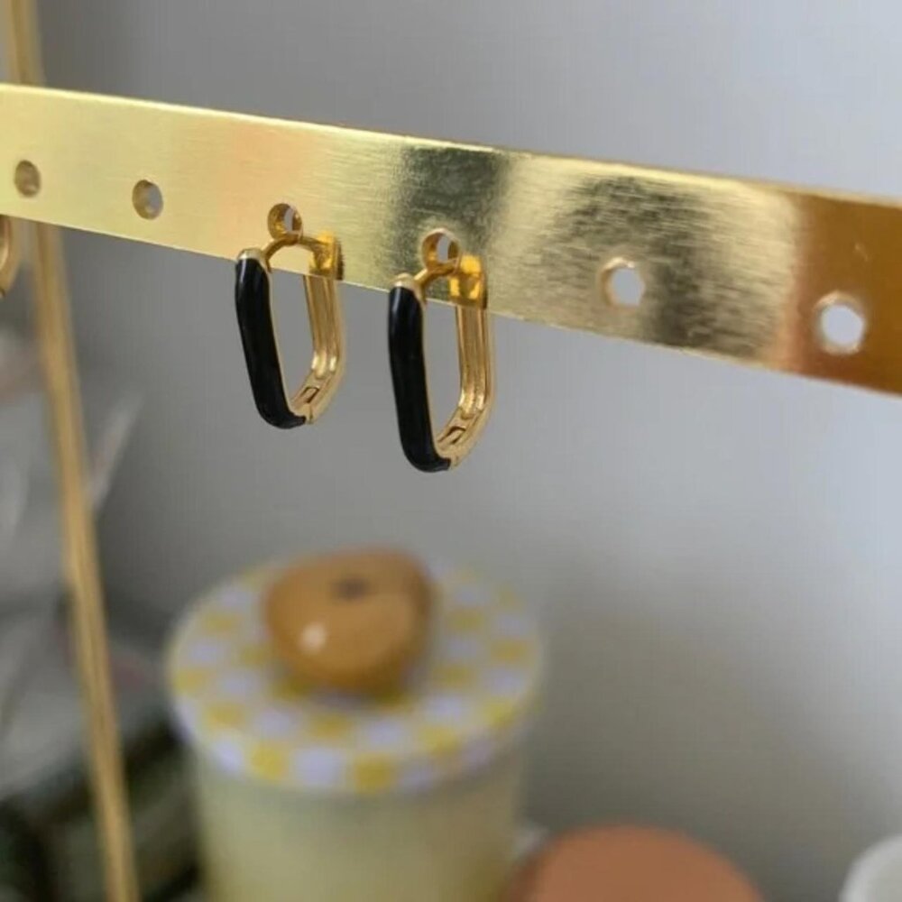 The Gia Noire Black and gold oval hoop earrings , hoops